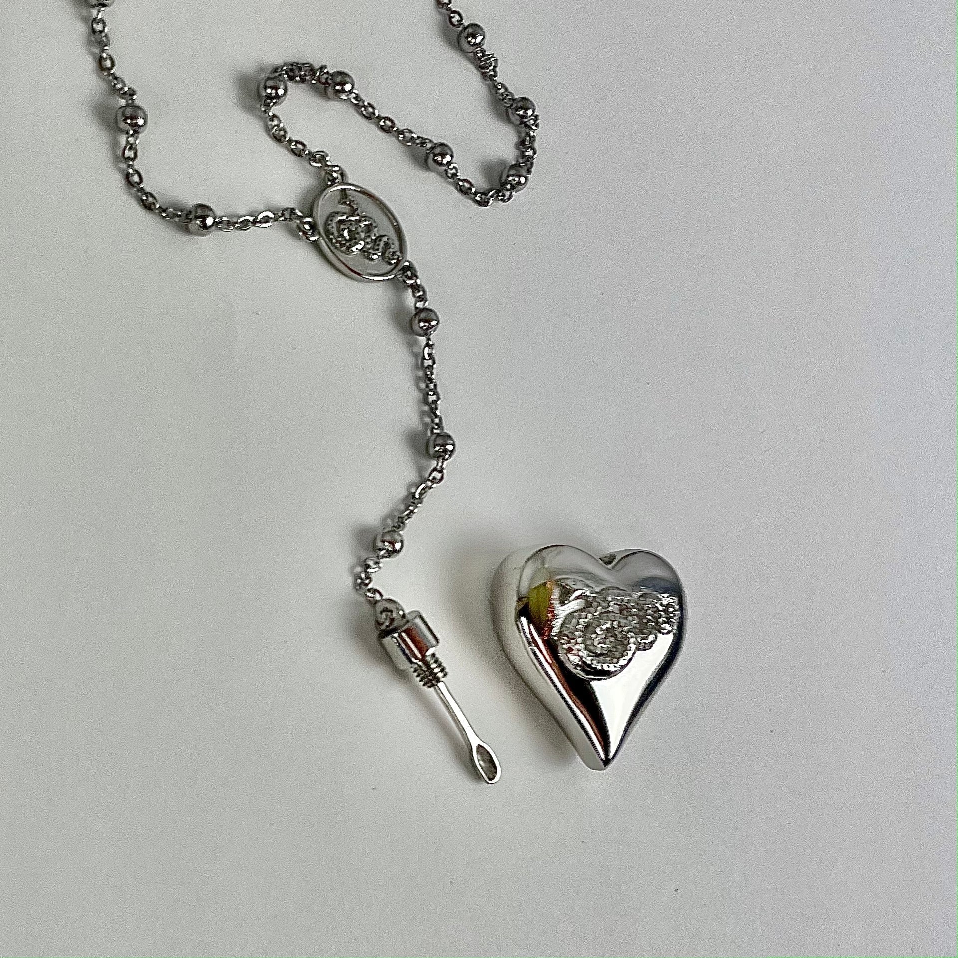 Amazon.com: Holy rose Saint Lana Del Rey LDR Style Stash Necklace Heart  Shaped With Snakes & Spoon stainless steel (gold) : Clothing, Shoes &  Jewelry